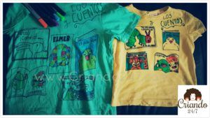 camisetas verde y amarilla, con las portadas de los cuentos favoritos de mis hijos pintadas con rotuladores